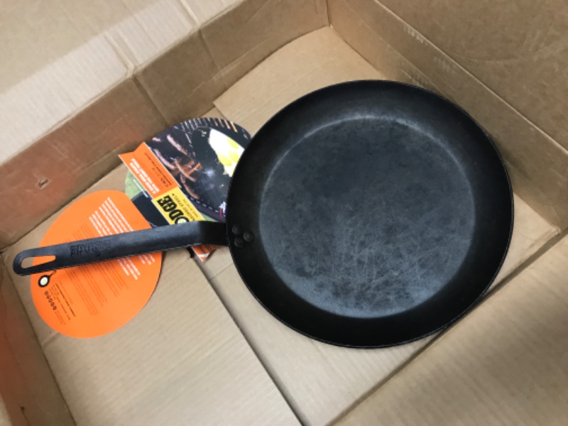 Photo 2 of **USED/MISSING HOLDERS**     Lodge CRS12 Carbon Steel Skillet, Pre-Seasoned, 12-inch & ASCRHH61 Silicone Hot Handle Holders for Carbon Steel Pans, Orange Black 12" Skillet + Handle Holders, Orange