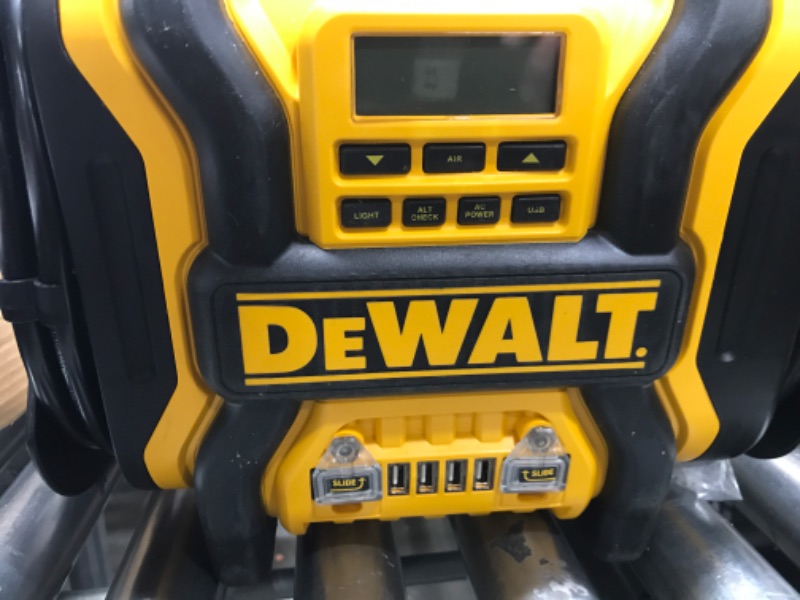 Photo 2 of DEWALT DXAEPS14 1600 Peak Battery Amp 12V Automotive Jump Starter/Power Station with 500 Watt AC Power Inverter, 120 PSI Digital Compressor, and USB Power , Yellow
**TESTED*** powers on all parts are there