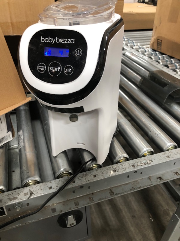 Photo 3 of Baby Brezza Formula Pro Mini Baby Formula Maker – Small Baby Formula Mixer Machine Fits Small Spaces and is Portable for Travel– Bottle Makers Makes The Perfect Bottle for Your Infant On The Go Formula Pro Mini Dispenser Machine