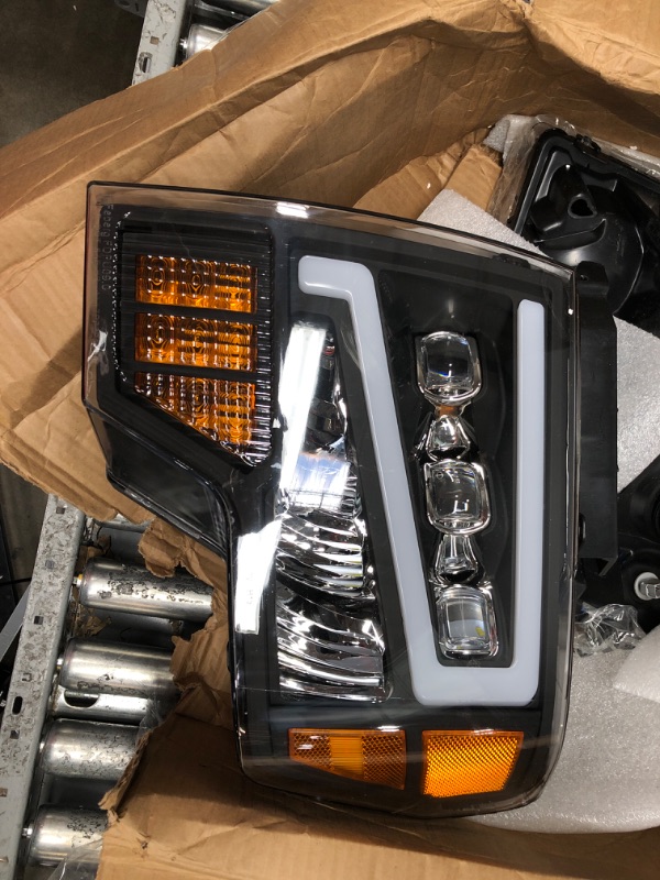 Photo 2 of **DAMAGE TO MOUNTS** Alpha Owls 7162952 Tri-Pro Series Full LED Projector Headlights With White LED Light Bar & Sequential Signal - Black Amber Fits 2009-2014 Ford F150 Halogen Models
