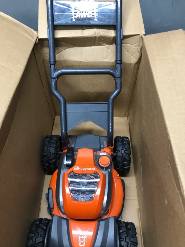 Photo 2 of 
Husqvarna 589289601 Toy Lawn Mower for HU800AWD