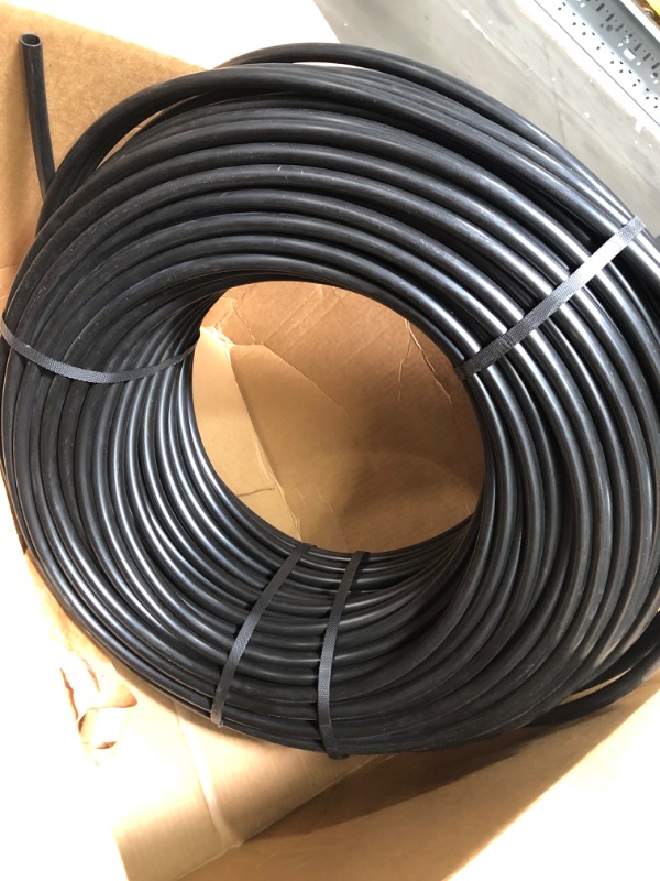 Photo 2 of 
Raindrip 052050 1/2-Inch Drip Irrigation Supply Tubing, 500-Foot, for Irrigation Drippers, Drip Emitters, Irrigation Parts, and Drip Systems, Black Polyethylene