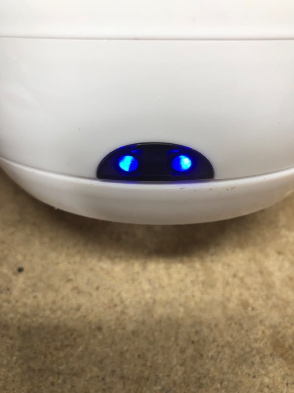 Photo 1 of *** POWERS ON *** white electric kettle