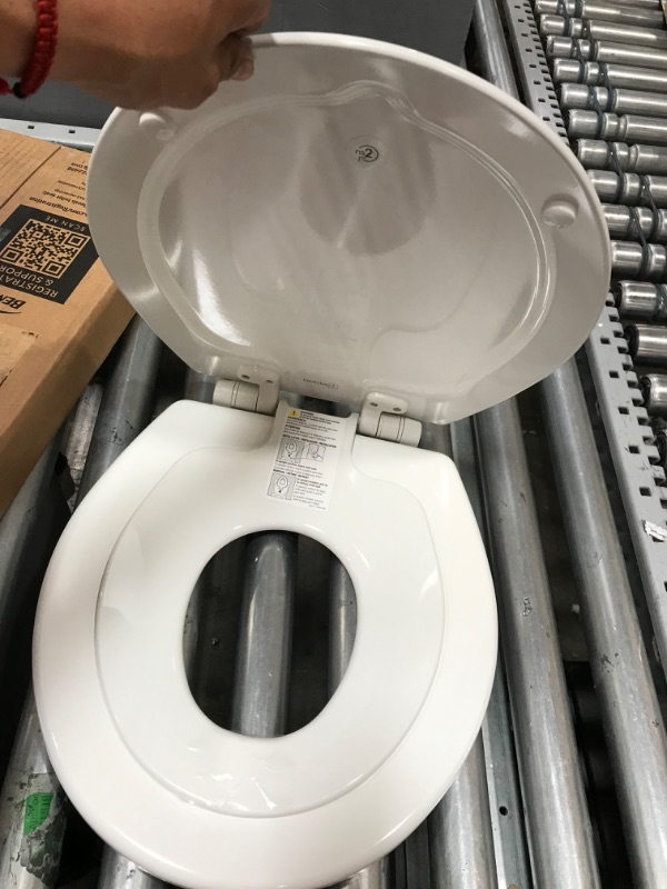 Photo 2 of *** USED *** *** LOOSE OR MISSING HARDWARE *** MAYFAIR 888SLOW 000 NextStep2 Toilet Seat with Built-In Potty Training Seat, Slow-Close, Removable that will Never Loosen, ROUND, White Round White