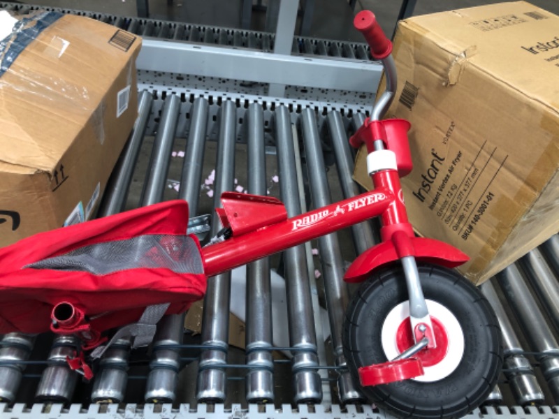 Photo 1 of Used / open parts *** Radio Flyer Ultimate All-Terrain Stroll 'N Trike, Kids and Toddler Tricycle, Red Toddler Bike, For Ages 9 Months - 5 Years Air Tire Ultimate