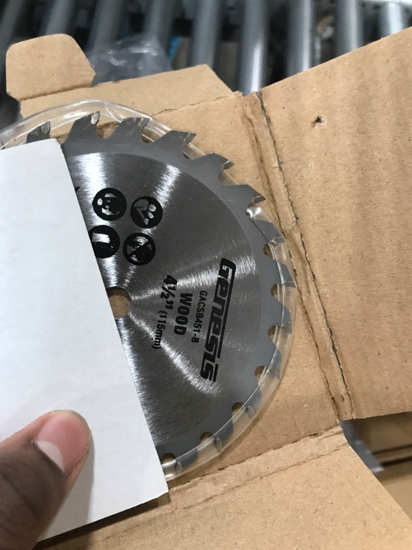 Photo 4 of Genesis GCS445SE 4.0 Amp 4-1/2" Compact Circular Saw with 24T Carbide-Tipped Blade, Rip Guide, Vacuum Adapter, and Blade Wrench & GACSB452 4 1/2" 60-Teeth High Speed Steel Circular Saw Blade Saw + Saw Blade