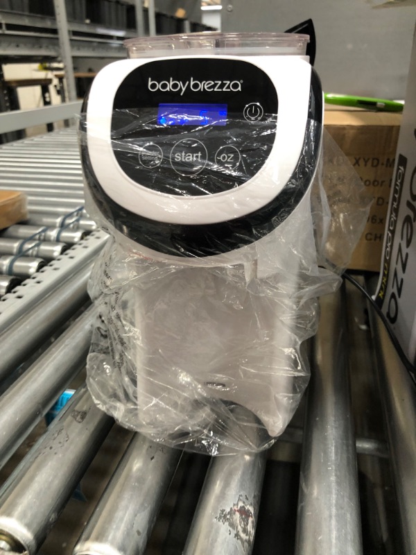 Photo 4 of Baby Brezza Formula Pro Mini Baby Formula Maker – Small Baby Formula Mixer Machine Fits Small Spaces and is Portable for Travel– Bottle Makers Makes The Perfect Bottle for Your Infant On The Go Formula Pro Mini Dispenser Machine