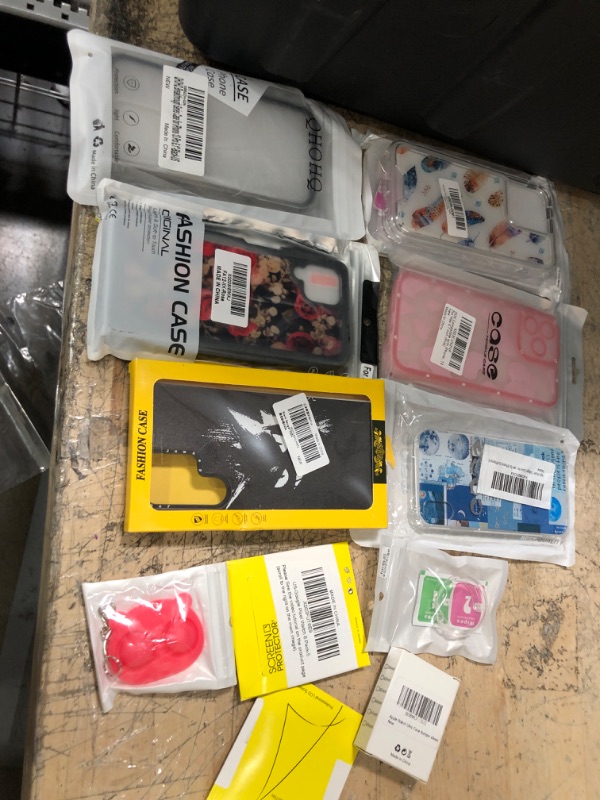 Photo 1 of miscellaneous bundle of assorted phone cases and other electrical goods