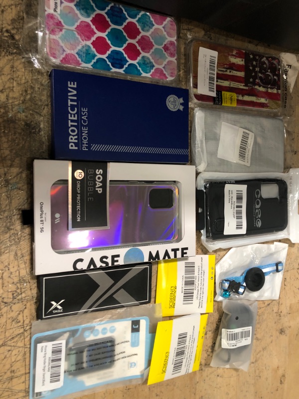 Photo 1 of miscellaneous bundle of assorted phone cases and electrical goods