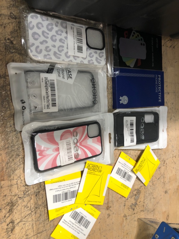 Photo 1 of miscellaneous bundle of assorted phone cases and other electrical goods