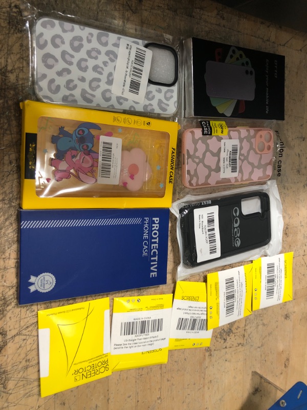 Photo 1 of miscellaneous bundle of assorted phone cases and electrical goods