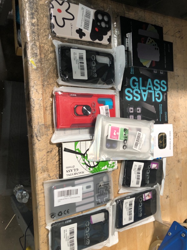 Photo 1 of miscellaneous bundle of assorted phone cases and electrical goods