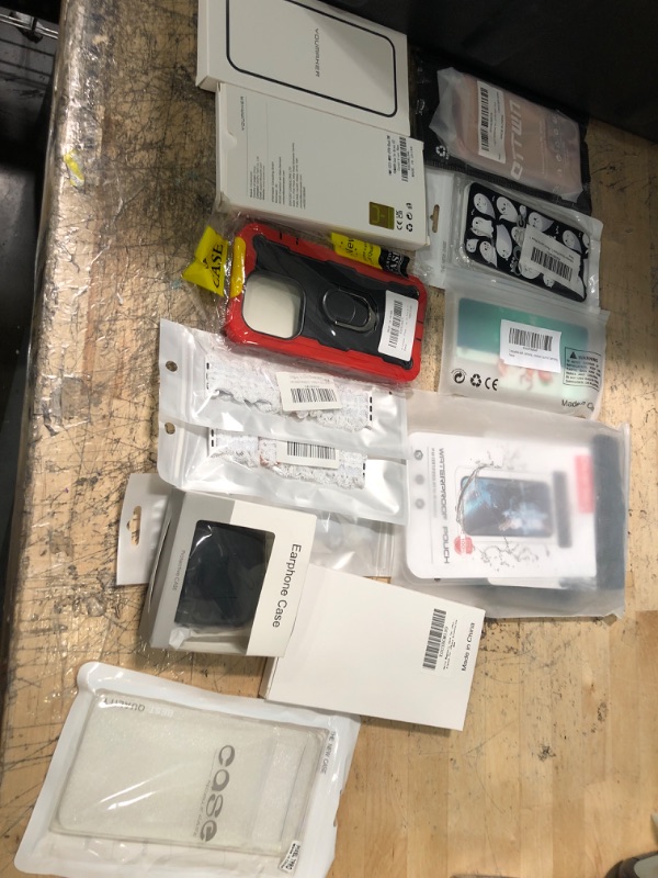 Photo 1 of miscellaneous bundle of assorted phone cases and electrical goods