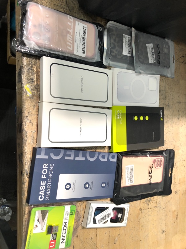 Photo 1 of miscellaneous bundle of assorted phone cases and electrical goods