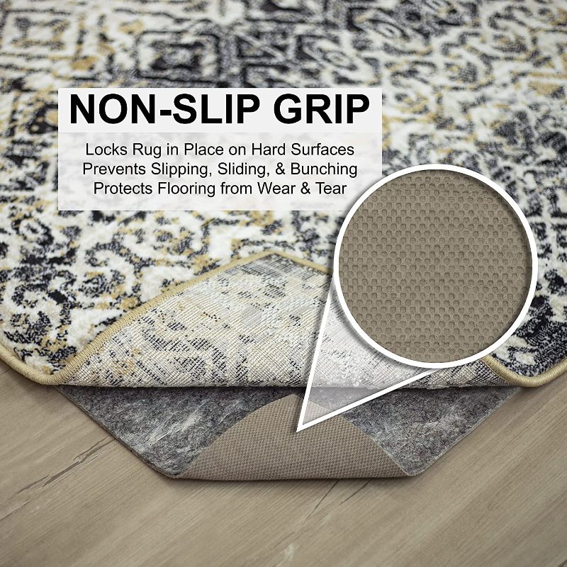 Photo 1 of 
Mohawk Home 10' x 13' Non Slip Rug Pad Gripper 1/2 Thick Dual Surface Felt + Rubber Gripper - Safe for All Floors
Style:1/2 Inch Dual Surface Rug Pad
Size:10' x 13'