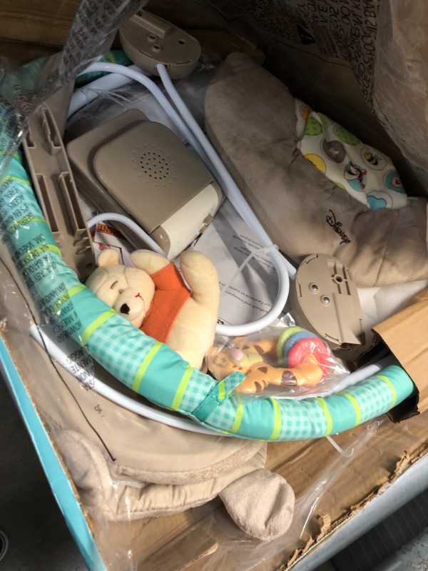 Photo 1 of Bright Starts Winnie the Pooh Dots & Hunny Pots Baby Bouncer with Vibrating Infant Seat, Music & 3 Playtime Toys, 23x19x23 Inch