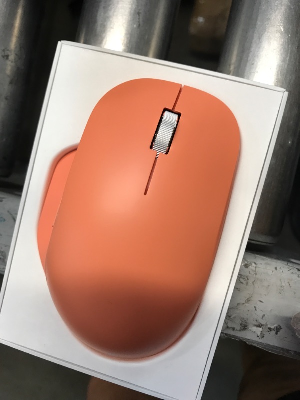 Photo 2 of Microsoft Bluetooth Ergonomic Mouse - Peach - with comfortable Ergonomic design, thumb rest, up to 15months battery life. Works with Bluetooth enabled PCs/Laptops Windows/Mac/Chrome computers