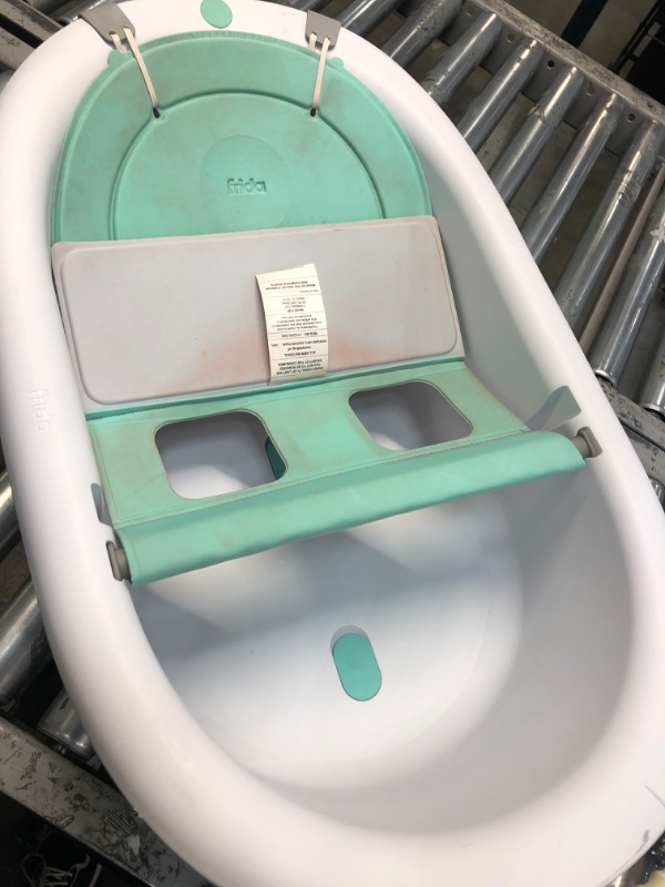 Photo 2 of *Used/Dirty* Frida Baby 4-in-1 Grow-with-Me Bath Tub| Transforms Infant Bathtub to Toddler Bath Seat with Backrest for Assisted Sitting in Tub
