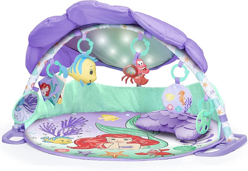 Photo 1 of Bright Starts The Little Mermaid Twinkle Trove Light-Up Musical Baby Activity Gym with Tummy Time Pillow, Newborn+
