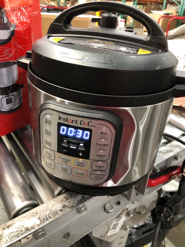 Photo 2 of **SLIGHT DENT**
Instant Pot Duo 7-in-1 Electric Pressure Cooker