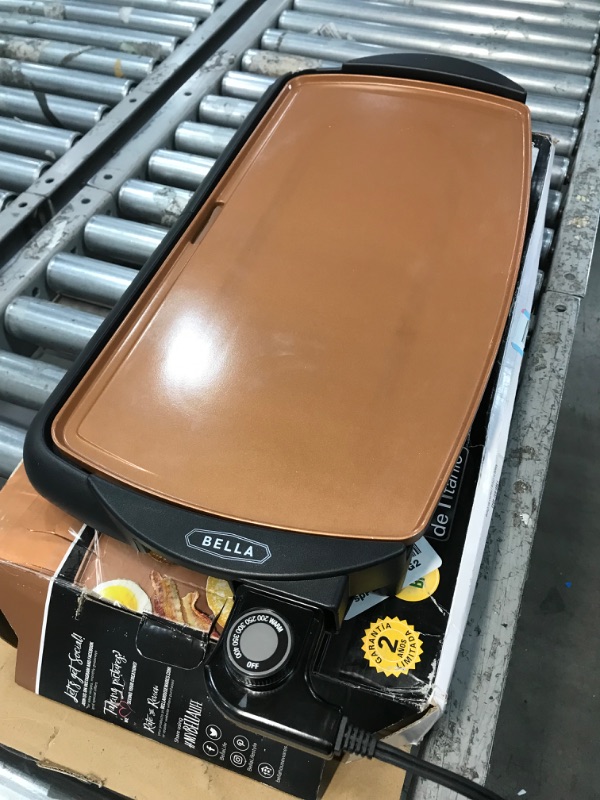 Photo 2 of **DAMAGED**BELLA Electric Ceramic Titanium Griddle, Make 10 Eggs At Once, Healthy-Eco Non-stick Coating, Hassle-Free Clean Up, Large Submersible Cooking Surface, 10.5" x 20", Copper/Black 10.5 x 20 INCH Copper
**HANDLE BROKEN**