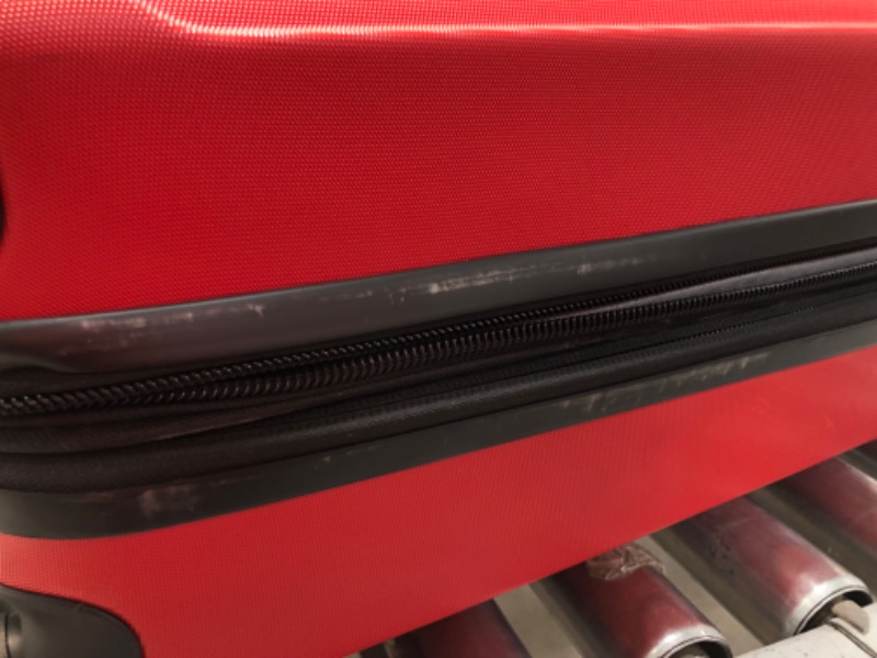 Photo 3 of **DAMAGE**FUL 21 Inch Pure Rolling Luggage, Hardshell Carry On Suitcase with Wheels, Red Carry-On 21-Inch Red
**DENT ON CORNER**