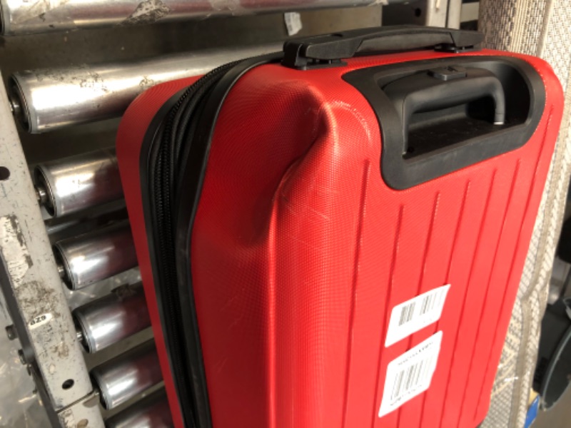 Photo 2 of **DAMAGE**FUL 21 Inch Pure Rolling Luggage, Hardshell Carry On Suitcase with Wheels, Red Carry-On 21-Inch Red
**DENT ON CORNER**