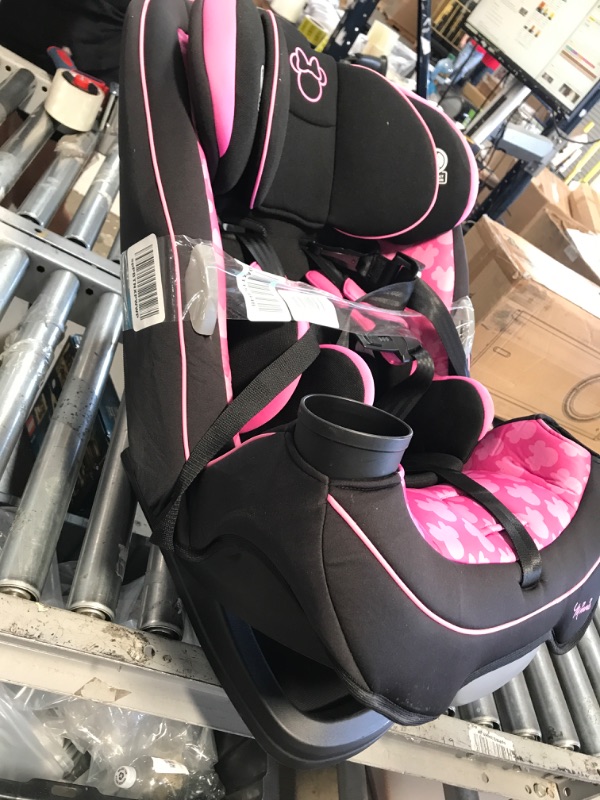 Photo 1 of Disney Baby Grow and Go All-in-One Convertible Car Seat, Rear-facing 5-40 pounds, Forward-facing 22-65 pounds, and Belt-positioning booster 40-100 pounds, Simply Minnie
