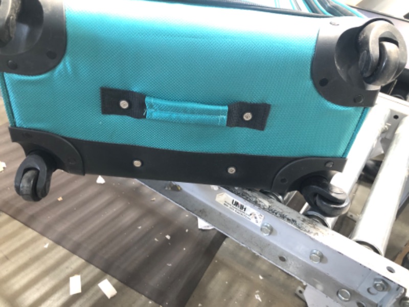 Photo 3 of **USED**   SwissGear Sion Softside Expandable Roller Luggage, Teal, Checked-Large 29-Inch Checked-Large 29-Inch Teal