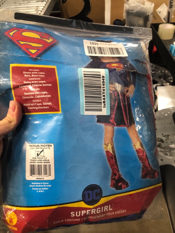 Photo 2 of **USED/BOOTS NOT INCLUDED**   Deluxe Supergirl Kids Costume Medium