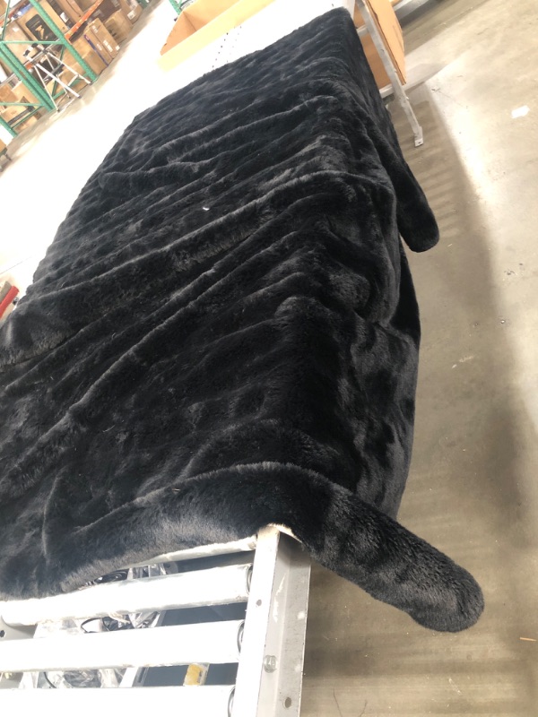 Photo 1 of **USED**  Large Fluffy Black Rug- unspecified dimensions 