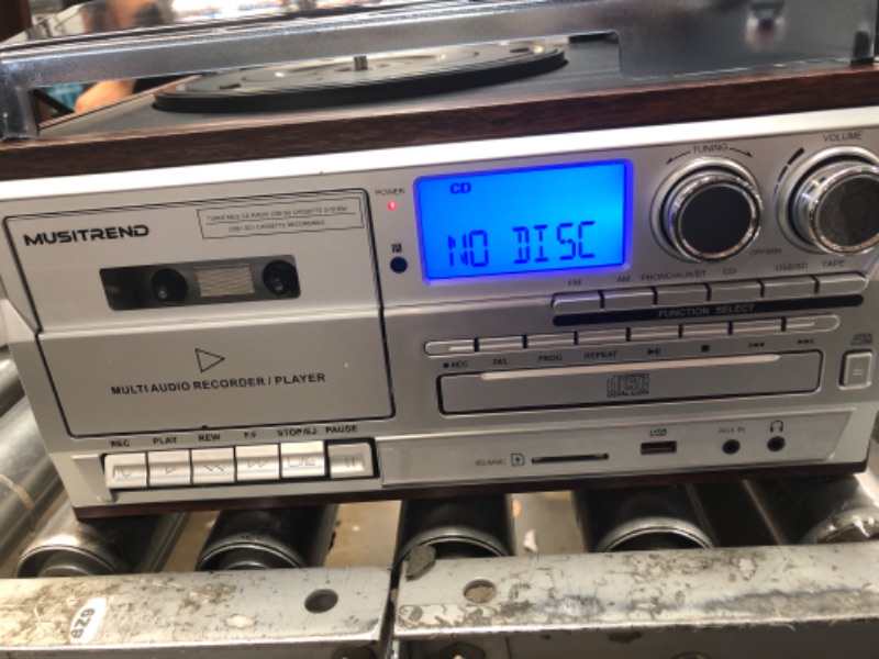 Photo 1 of MUSITREND 10 in 1 Record Player with External Speakers,3 Speed Bluetooth Turntable Vinyl Player with CD/Cassette Play,AM/FM Radio, USB/SD Encoding,Aux-in/RCA Line Out Silver