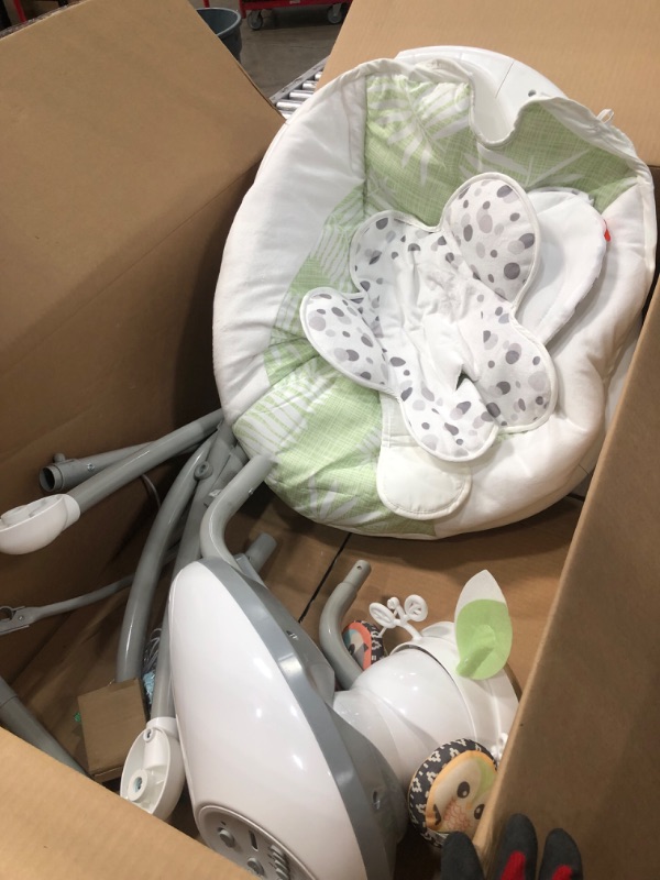 Photo 2 of ?Fisher-Price Snow Leopard Baby Swing, Dual-Motion Newborn Seat with Music, Sounds, and Motorized Mobile
