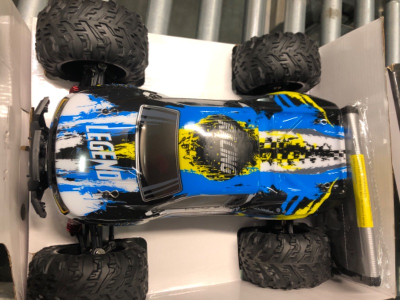 Photo 9 of LAEGENDARY Fast RC Cars for Adults and Kids - 4x4, Off-Road Remote Control Car - Battery-Powered, Hobby Grade, Waterproof Monster RC Truck - Toys and Gifts for Boys, Girls and Teens Blue - Yellow Blue Yellow Up to 31 mph