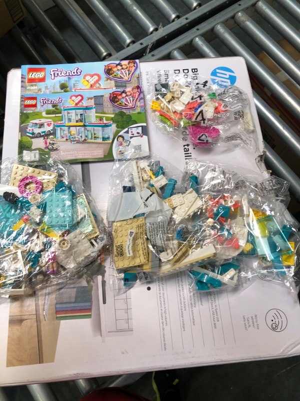 Photo 1 of LEGO 41394 Friends Heartlake City Hospital Playset with Emma and 2 Other Mini Dolls

**OPNED BOX FOR PICTURES**