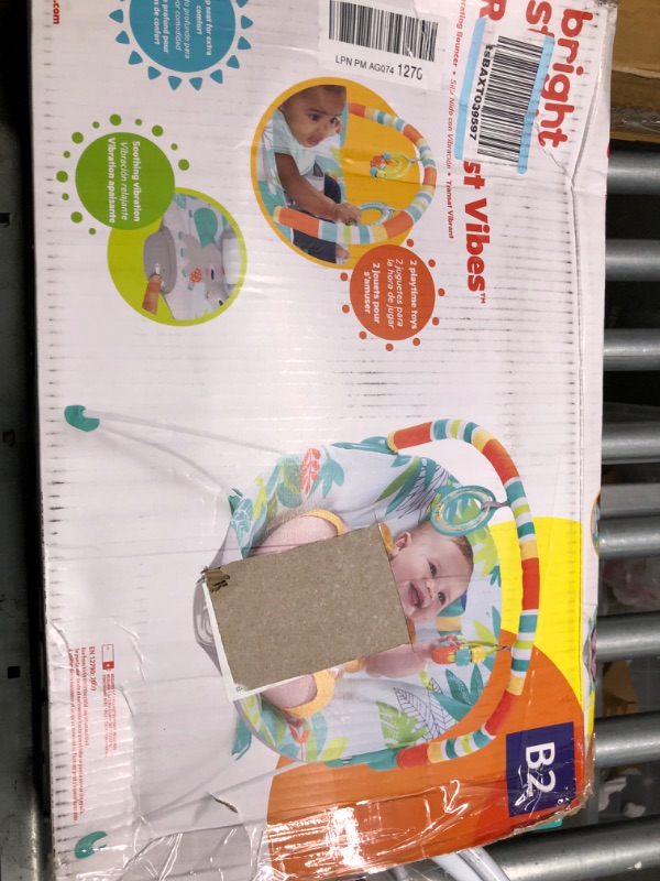Photo 1 of Bright Starts Rainforest Vibes 3-Point Harness Vibrating Baby Bouncer with -Toy bar
