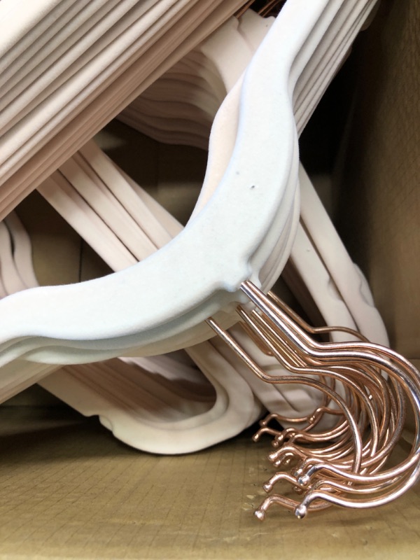 Photo 3 of Amazon Basics Slim, Velvet, Non-Slip Suit Clothes Hangers, Blush Pink/Rose Gold - Pack of 100 Blush Pink/Gold 100-Pack Suit Hangers