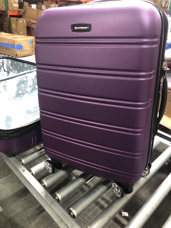 Photo 3 of ***Zipper problem for large one **** Rockland Melbourne Hardside Expandable Spinner Wheel Luggage, Purple