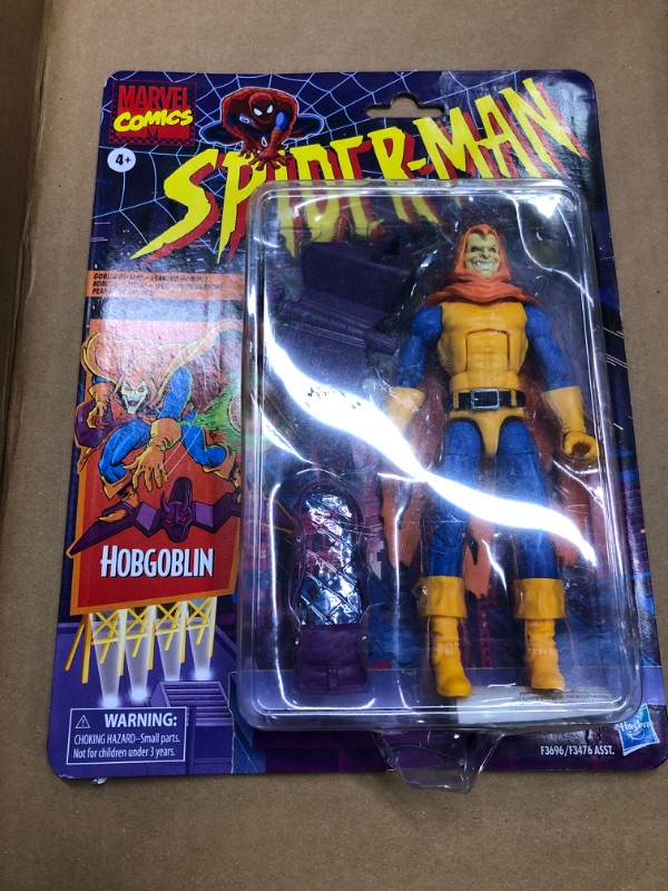 Photo 2 of Spider-Man Marvel Legends Series 6-inch Hobgoblin Action Figure Toy, Toy Biz Inspired Design, Includes 3 Accessories: Glider, Pumpkin Bomb, Satchel Standard