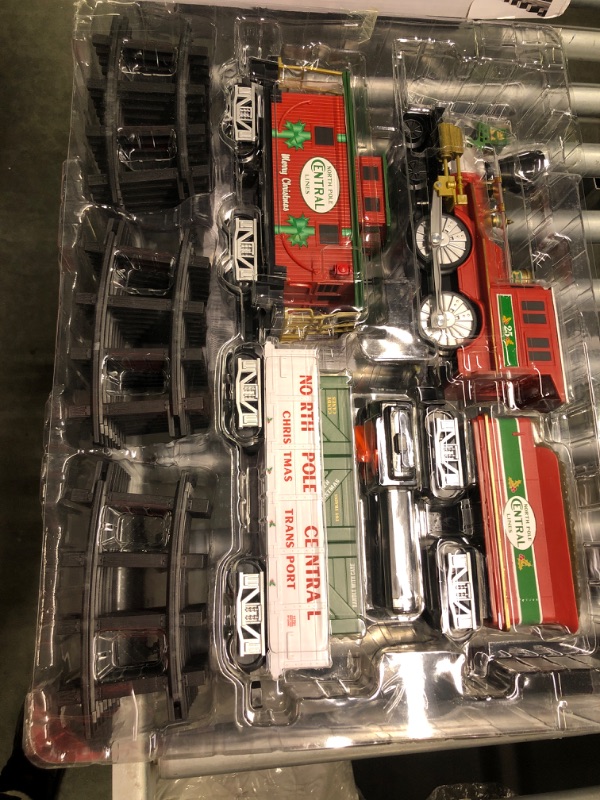 Photo 1 of Lionel North Pole Central Battery-Powered Train Set with Remote + Inner Loop Track Expansion Pack Complete Set + Expansion Track (Inner Loop)