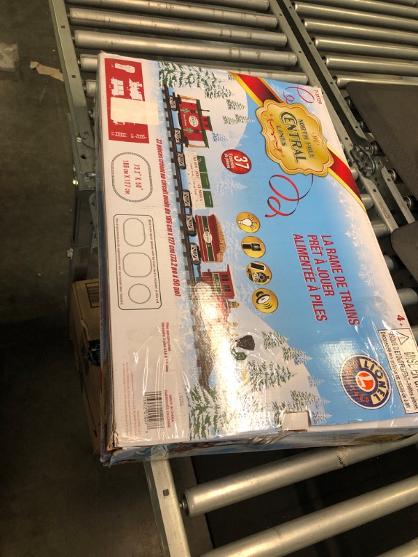 Photo 1 of Lionel North Pole Central Battery-Powered Train Set with Remote + Inner Loop Track Expansion Pack Complete Set + Expansion Track (Inner Loop)