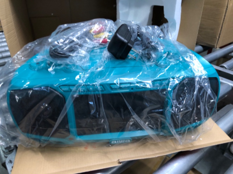 Photo 1 of Aiwa Portable Boombox, Crystal Clear Sound with 3W x 2 Speakers and Bass Function, Featuring a 7" LCD Display, Bluetooth Connectivity, FM Radio, CD/DVD Player, Streaming on Roku and Amazon Firestick Aqua Blue