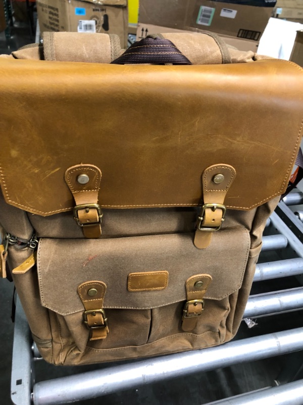 Photo 1 of JAEP Camera Backpack - Weather Resistant 16 Ounces Waxed Memory Canvas – DSLR SLR Backpacks with 15.6” laptop sleeve compartment and Tripod Holder for Photographers -Vintage leather Style (Khaki)
