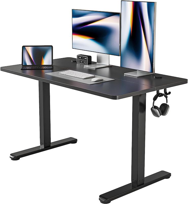 Photo 1 of FEZIBO Height Adjustable Electric Standing Desk, 48 x 24 Inches Stand up Table, Sit Stand Home Office Desk with Splice Board, Black Frame/Black Top