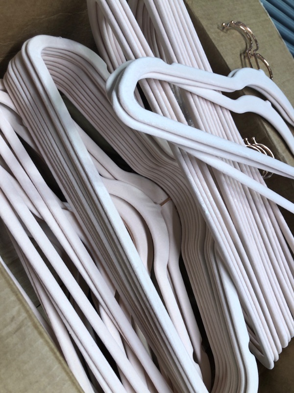 Photo 1 of Amazon Basics Slim, Velvet, Non-Slip Suit Clothes Hangers, Ivory/Rose Gold - Pack of 30

