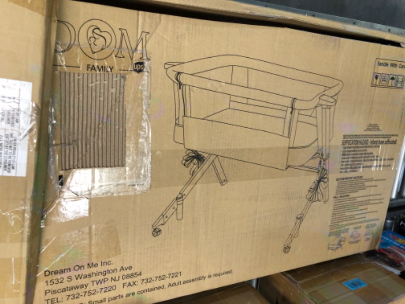 Photo 1 of Dream On Me Skylar Bassinet and Beside Sleeper, JPMA Certified, Carry Bag Included, GREY