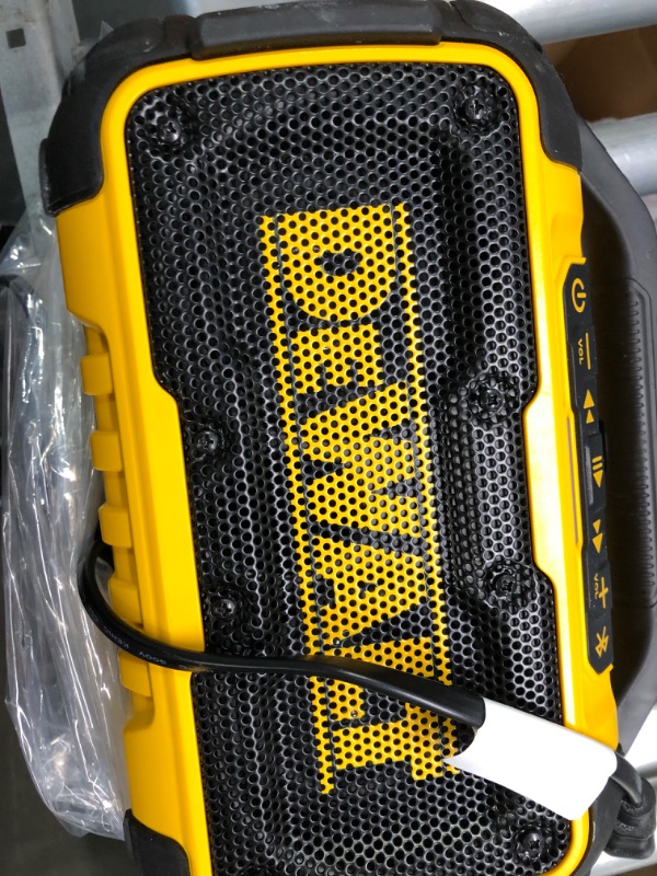 Photo 3 of DEWALT 20V MAX Bluetooth Speaker, 100 ft Range, Durable for Jobsites, Phone Holder Included, Lasts 8-10 Hours with Single Charge (DCR010), Yellow/Black