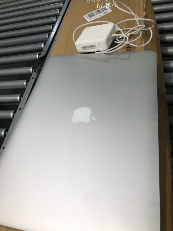 Photo 3 of ***ITEM IS REFURBISHED*** Apple MacBook Pro (15-Inch, Latest Model, 16GB RAM, 256GB Storage) - Space Gray

***small dent--pictured****looks new