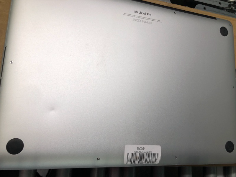 Photo 5 of ***ITEM IS REFURBISHED*** Apple MacBook Pro (15-Inch 16GB RAM, 256GB Storage) - Space Gray Retina, 15-inch, Mid 2014

***small dent--pictured****looks new
