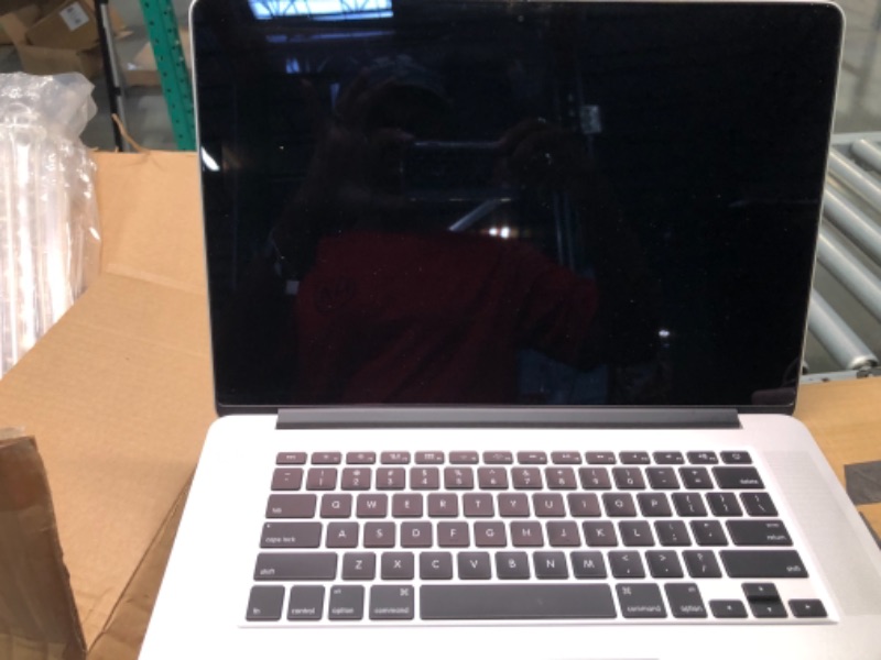 Photo 4 of ***ITEM IS REFURBISHED*** Apple MacBook Pro (15-Inch 16GB RAM, 256GB Storage) - Space Gray Retina, 15-inch, Mid 2014

***small dent--pictured****looks new